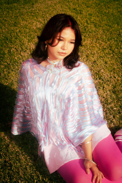 Woven Histories: The Pinkie Poncho